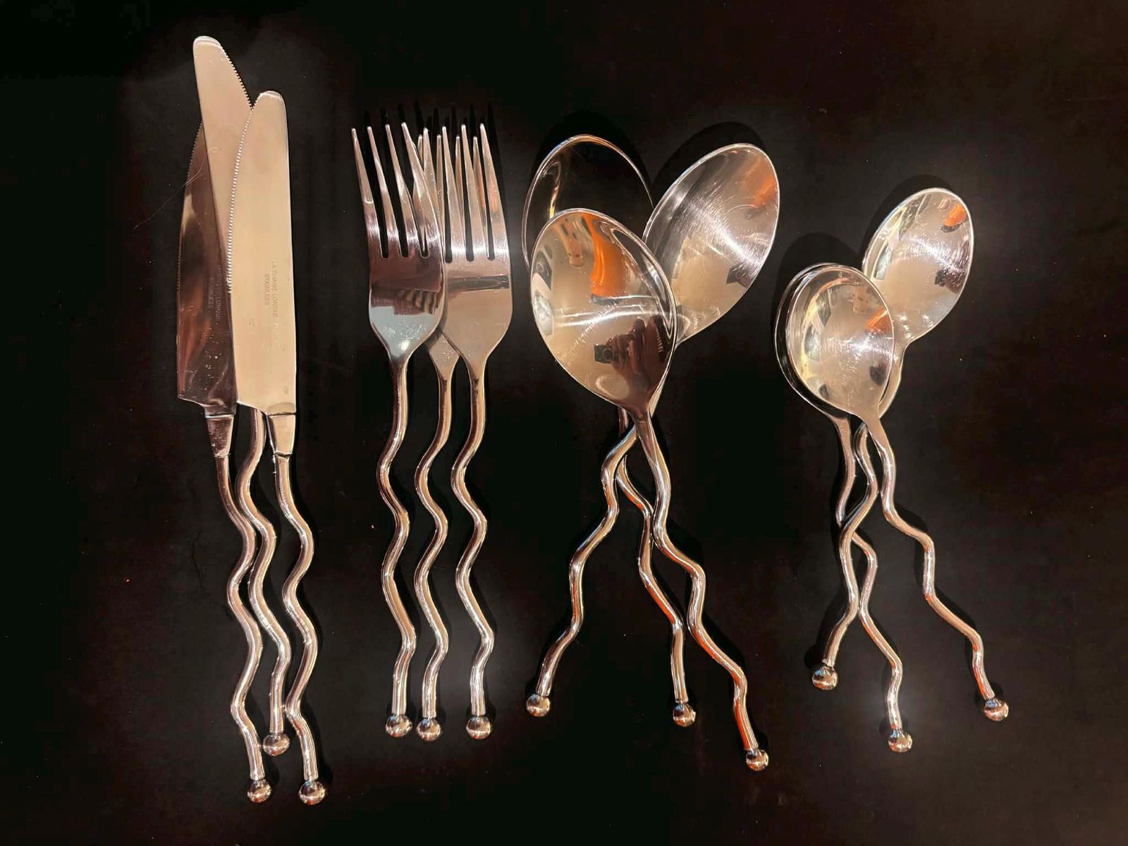 photo furniture Twisted Stainless Steel Flatware Set, French Brutalist Medieval Style, 12 Pieces