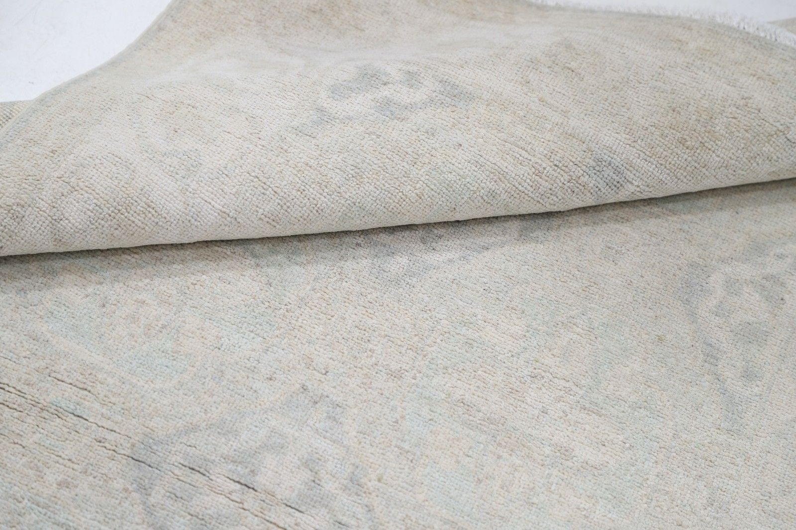 Tapis d'appoint traditionnel noué à la main, beige, 92 x 158 cm. Revêtement de sol en laine photo Textiles
