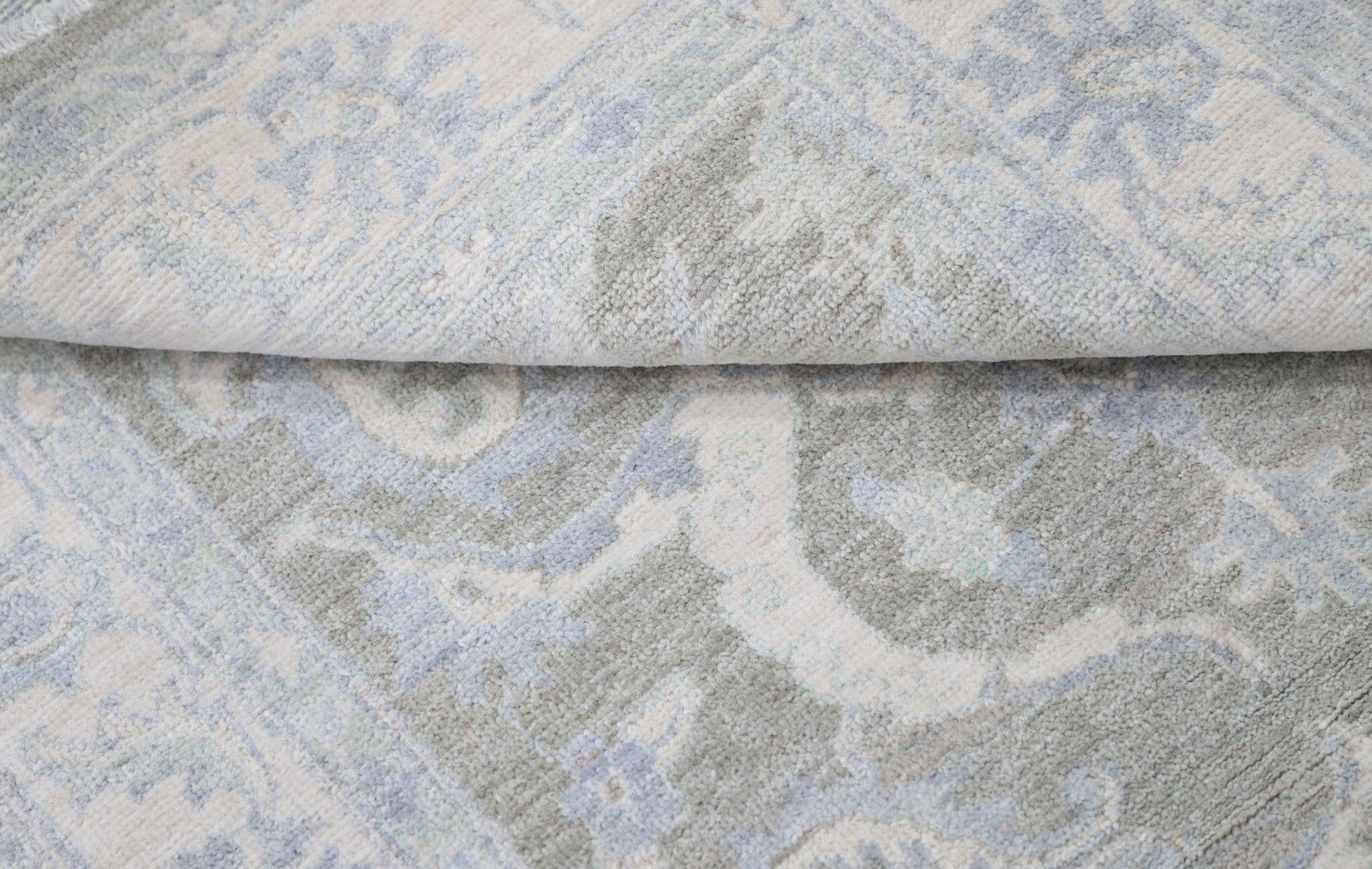 Handgeknoopt Turks vloerkleed 90 x 150 cm in zachte kleuren, 100% wol photo Textiel