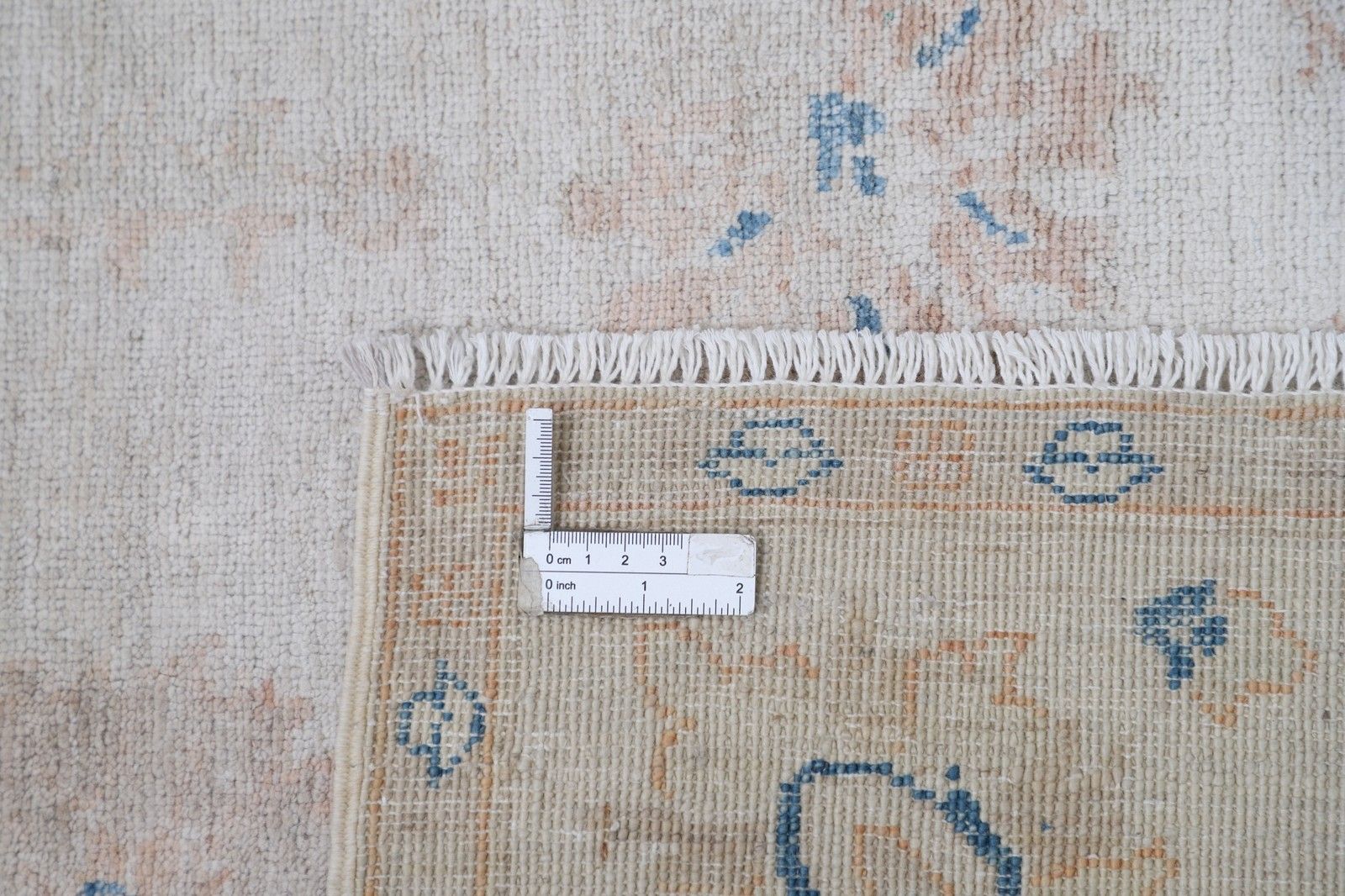 Tapis en laine noué à la main, 1 x 1,46 m. Petit tapis beige à motif floral sur toute la surface photo 772.0