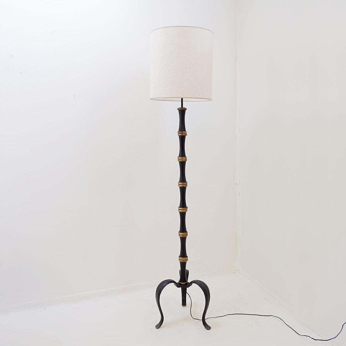 Tripod Floor Lamp In Wrought Iron And Brass With A Bamboo Style Stem photo vinterior