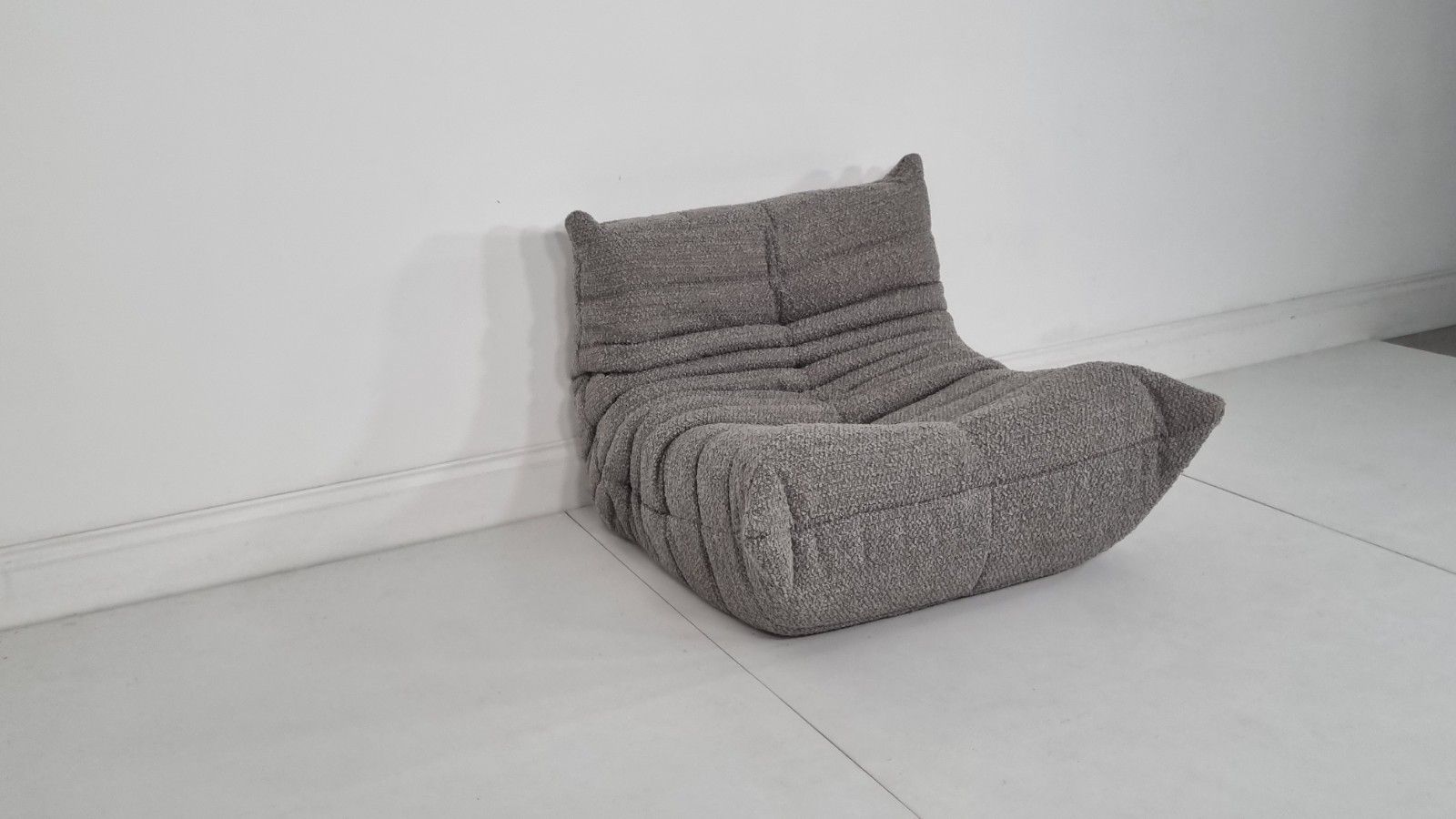 photo furniture Ligne Roset Togo Chair In Grey Boucle In Immaculate Condition