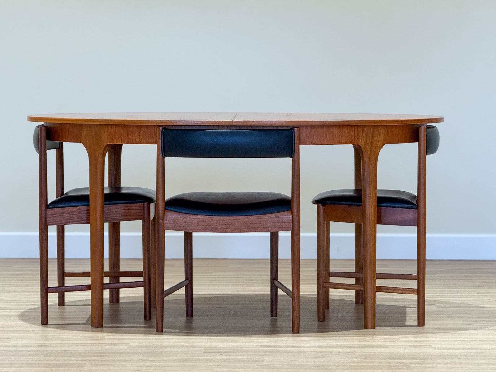 A McIntosh Extending Oval Dining Set By Tom Robertson — Dunvegan Collection, 1960s