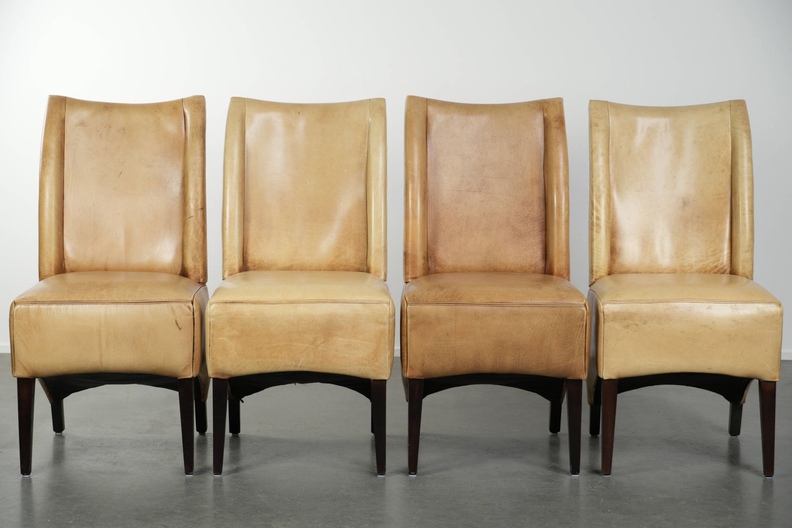 Luxury Set Of Four Cowhide Leather Dining Chairs With A Beautiful Light Color, Comfortable Seat, And A High Back photo furniture