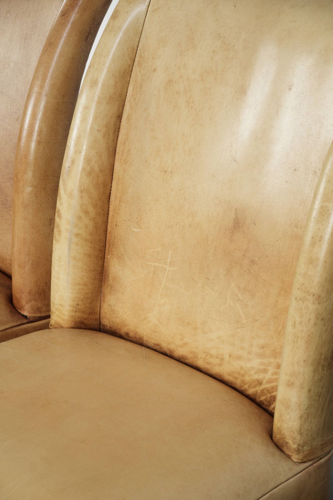 photo for sale Luxury Set Of Four Cowhide Leather Dining Chairs With A Beautiful Light Color, Comfortable Seat, And A High Back
