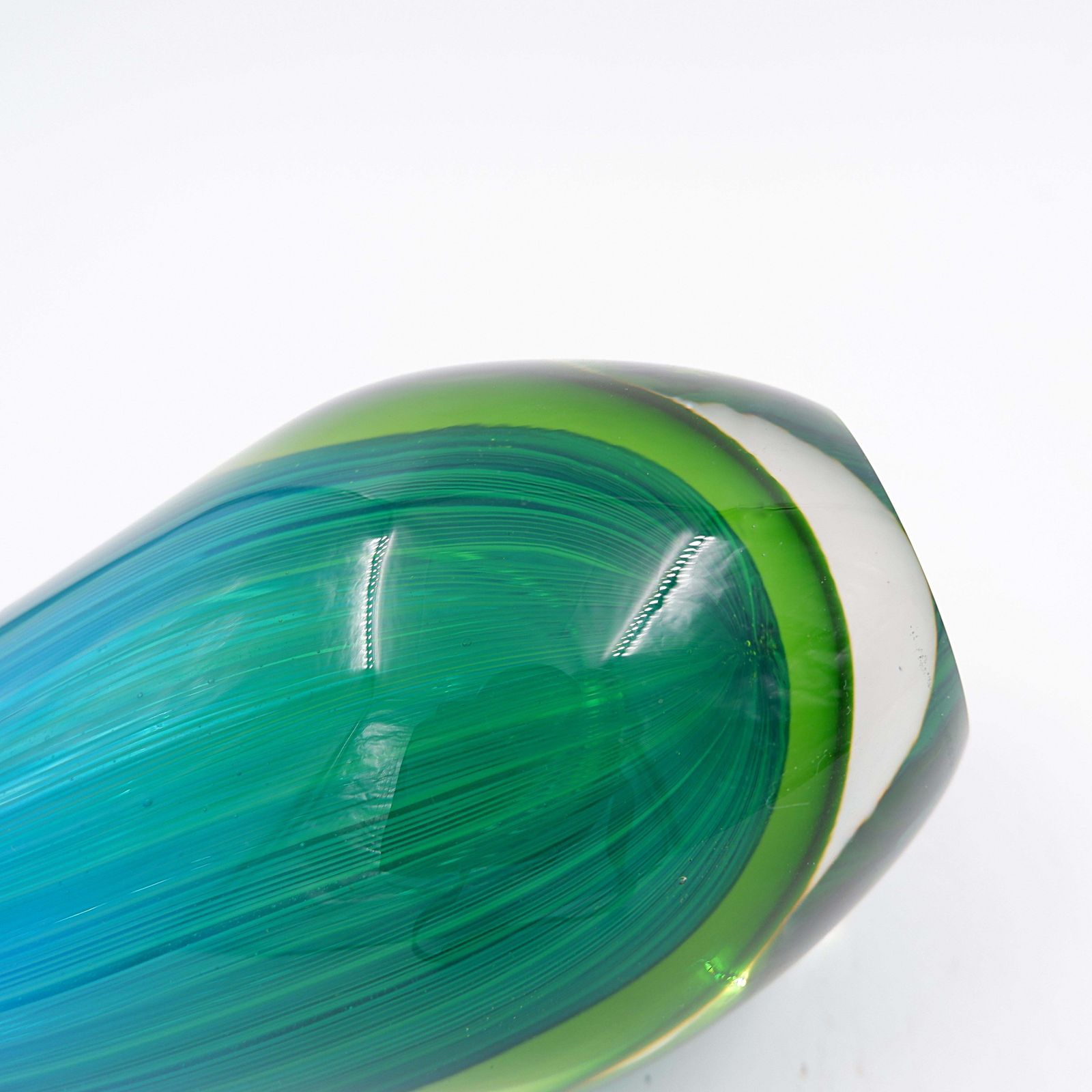 Art Glass Sculpture In The Shape Of A Teardrop In Shades Of Blue And Green photo Art