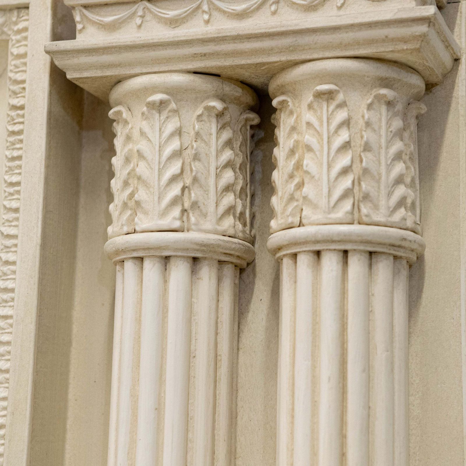 Ornate Neoclassical Style Wooden Surround With Capitals photo for sale