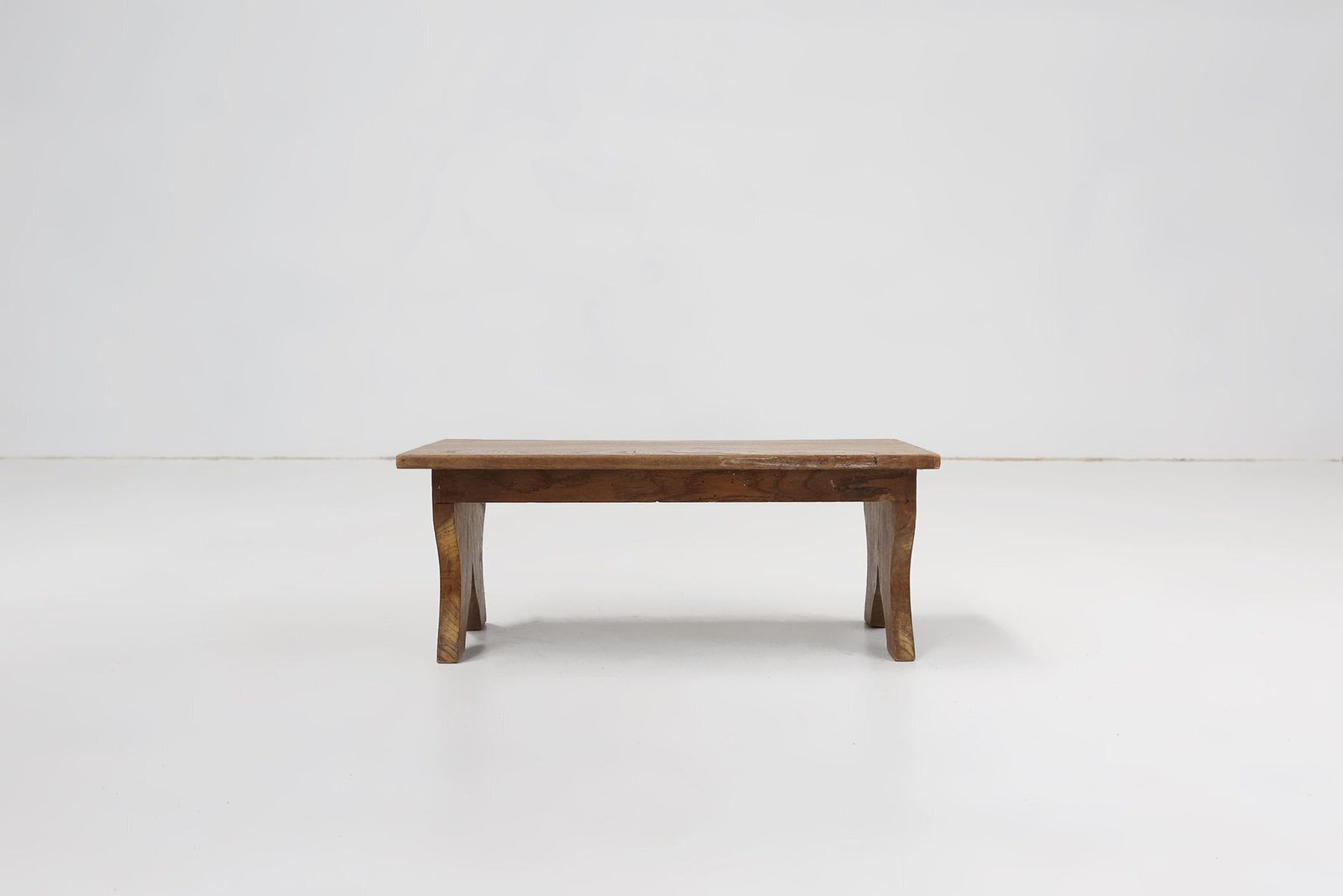 photo for sale Small Rustic Wooden Stool With Curved Base, France, 1900s