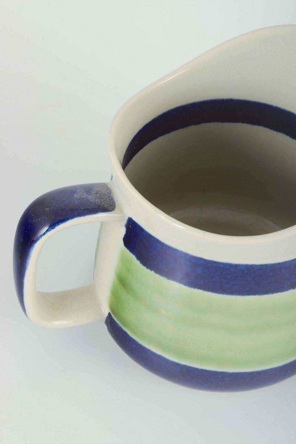 Rörstrand, Sweden “Lotta”. Two Jugs In Faience With White, Green And Blue Glaze. photo for sale