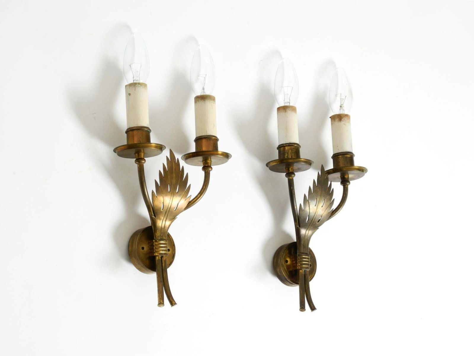 A Pair Of Rare, Mid Century Modern Brass Wall Lamps By Vereinigte Werkstätten photo furniture