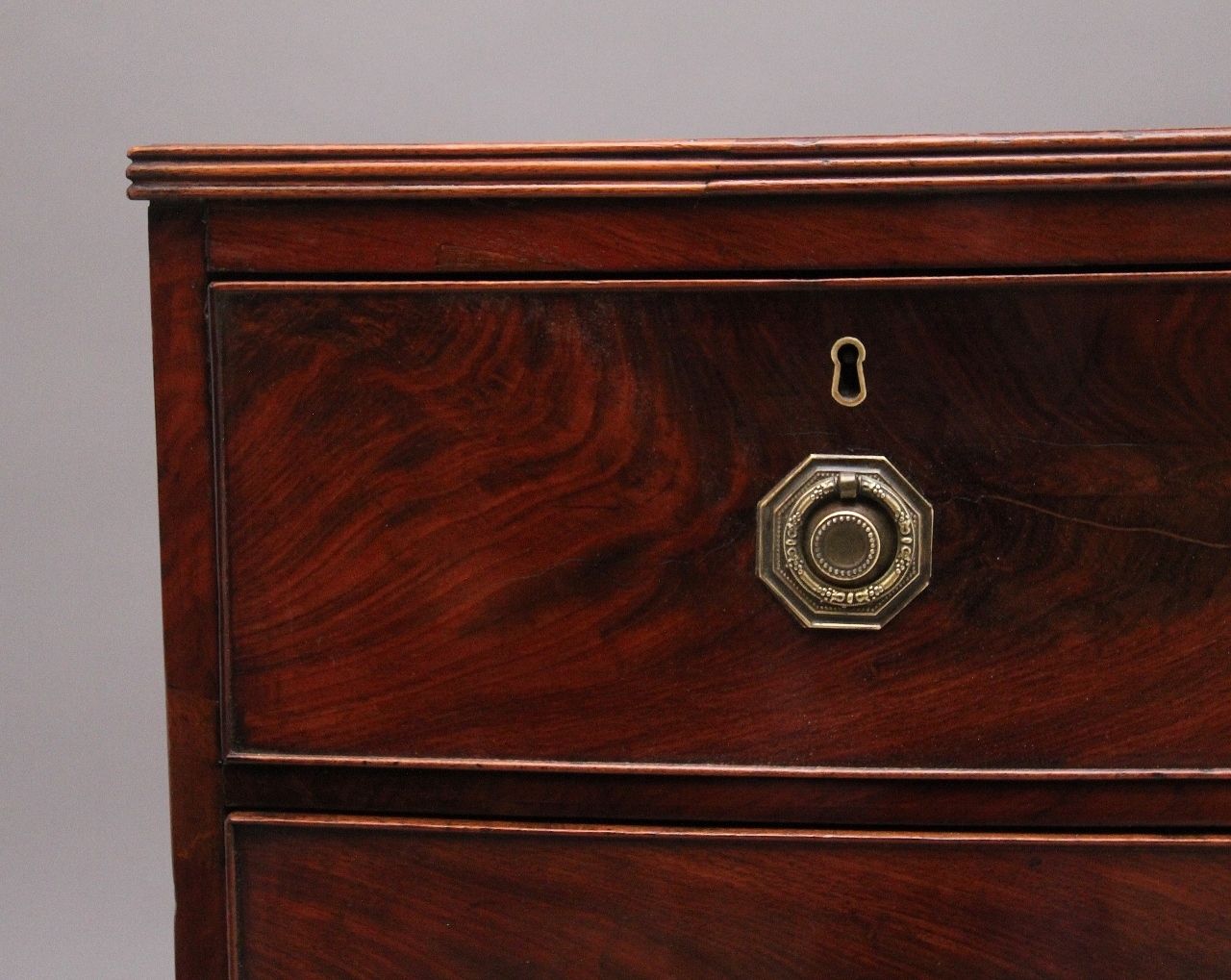 Early 19th Century Flame Mahogany Bowfront Chest photo for sale