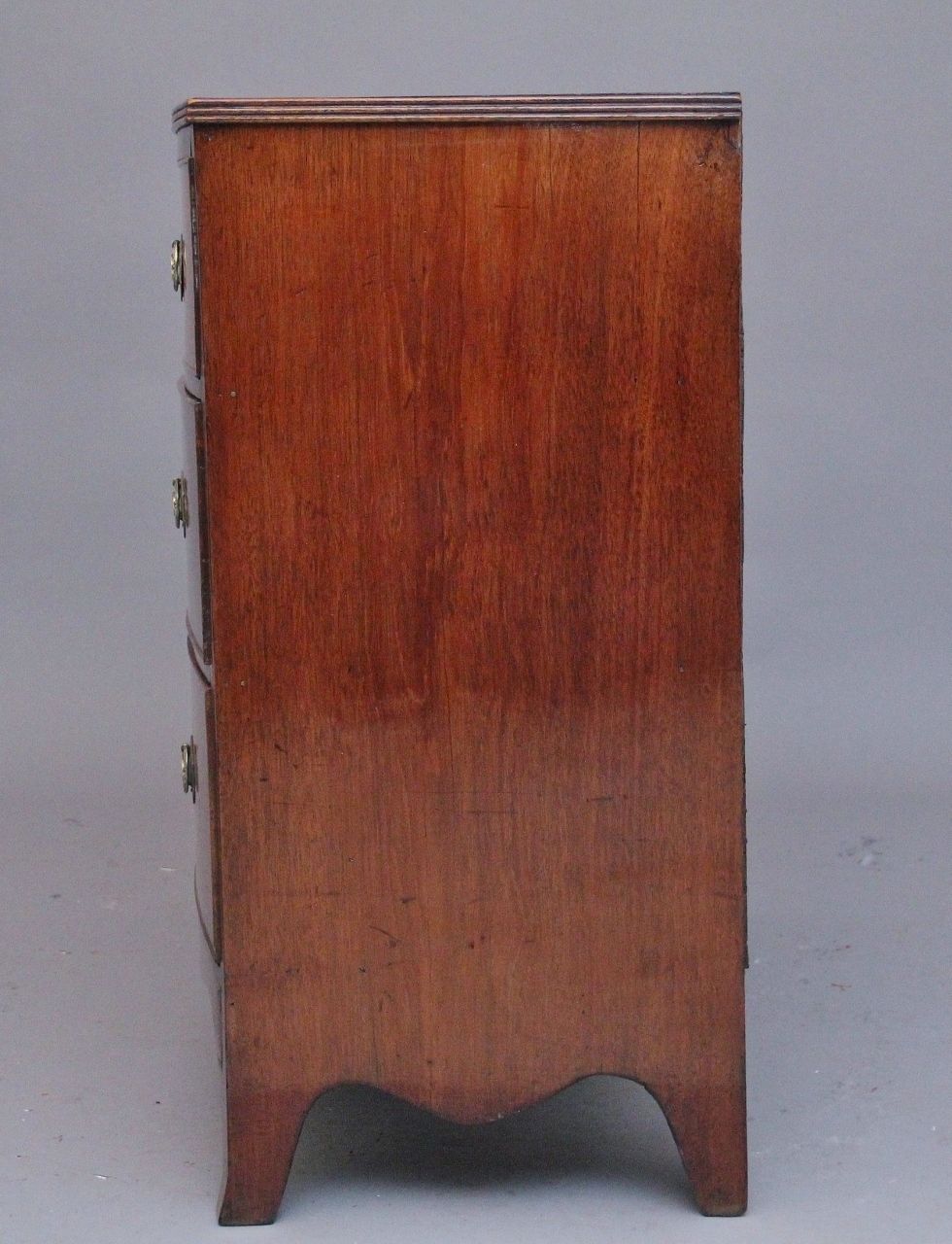 photo for sale Early 19th Century Flame Mahogany Bowfront Chest