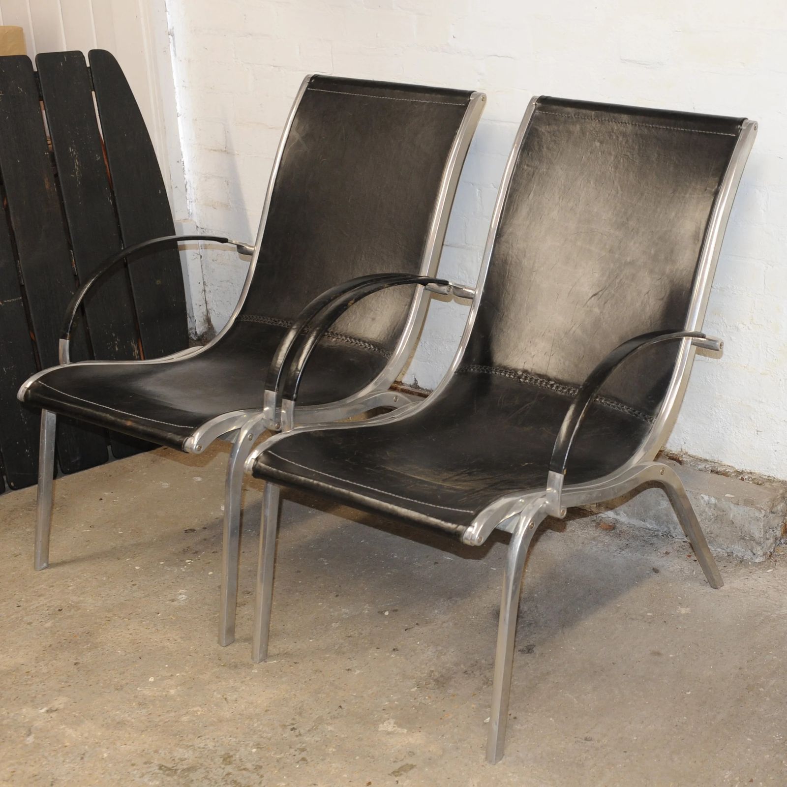 Pair Of Mid Century Leather And Aluminium Lounge Chairs By Rudolf Szedleczky, 1970s photo vintage