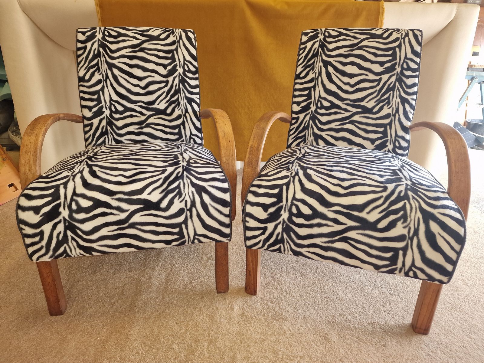 Two Mid Century  Curved Arm Occasional Chairs.