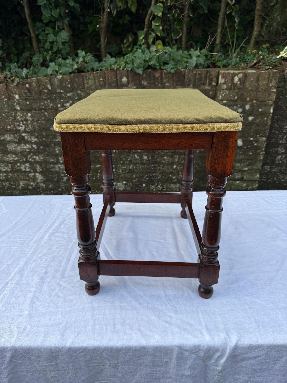 Vintage Upholstered Mahogany Footstool Or Occasional, Vanity Stool With Turned Legs And Green Velvet Like Seat photo 145.0