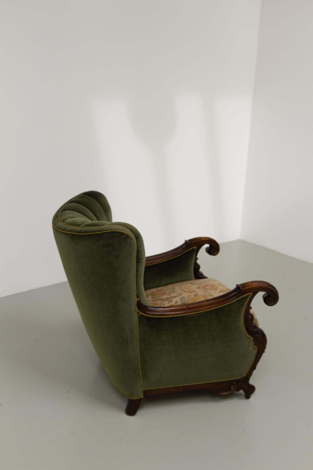 photo furniture Danish Carved Lounge Chair In Green Velvet, 1920s.