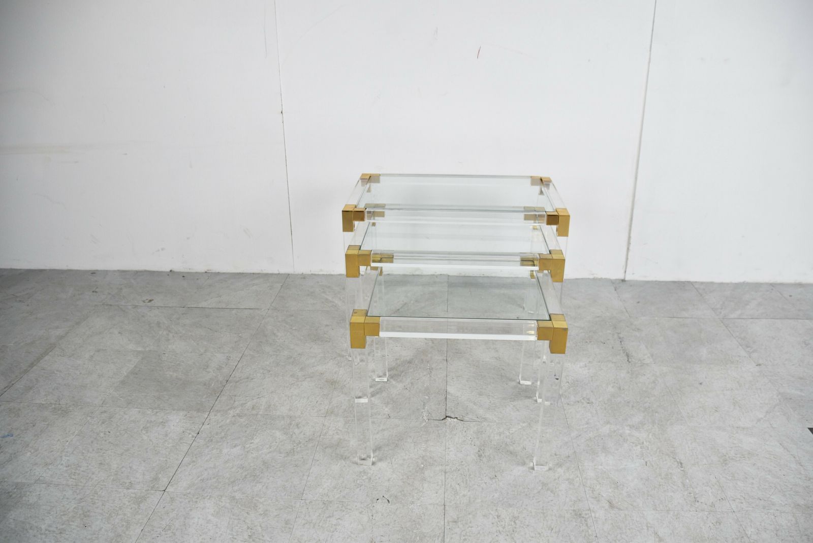 photo furniture Nest Of Brass And Lucite Tables, 1970s