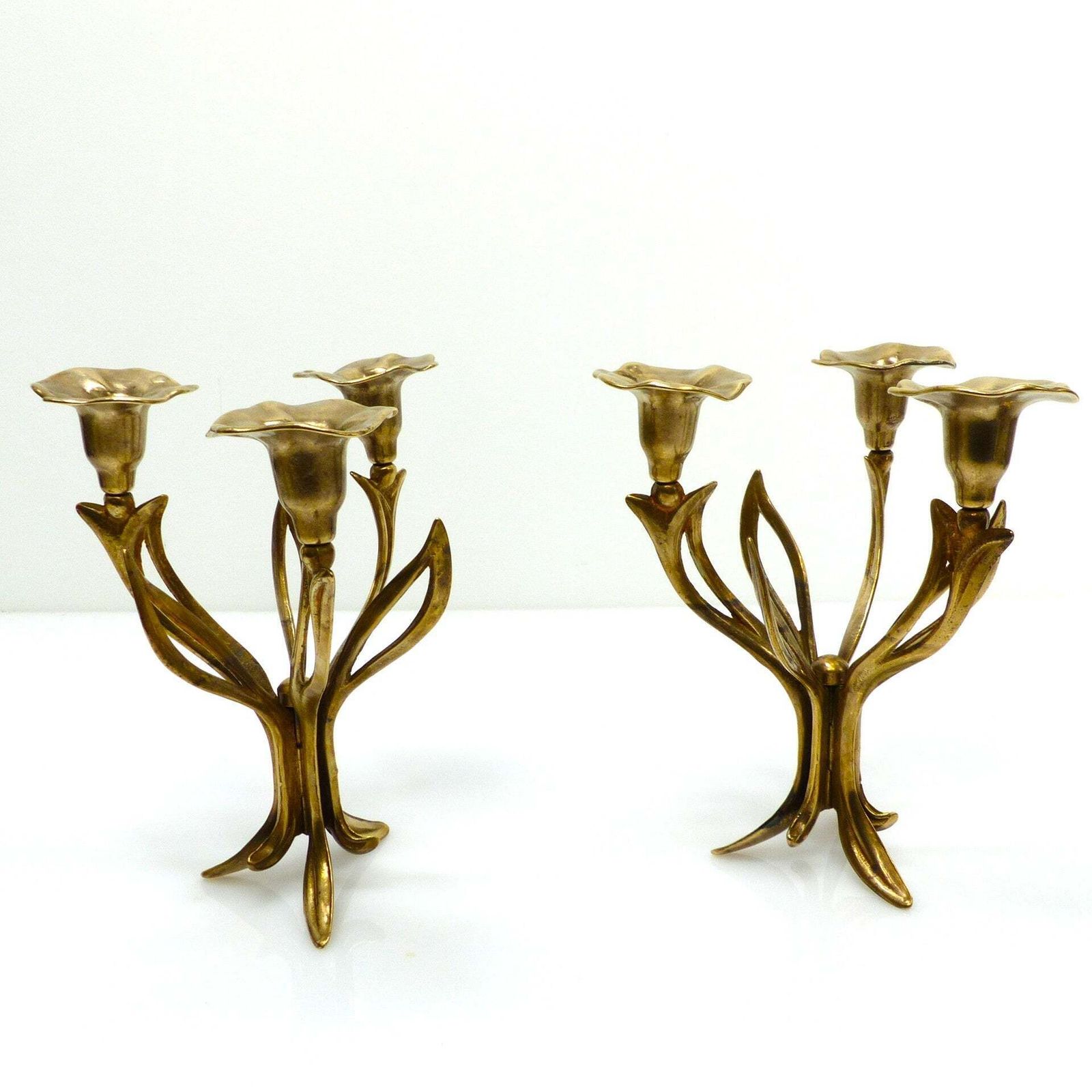 Pair Of Three Light Tripod Brass Candlesticks With Organic Floral Decoration, Circa 1960–1970 photo furniture
