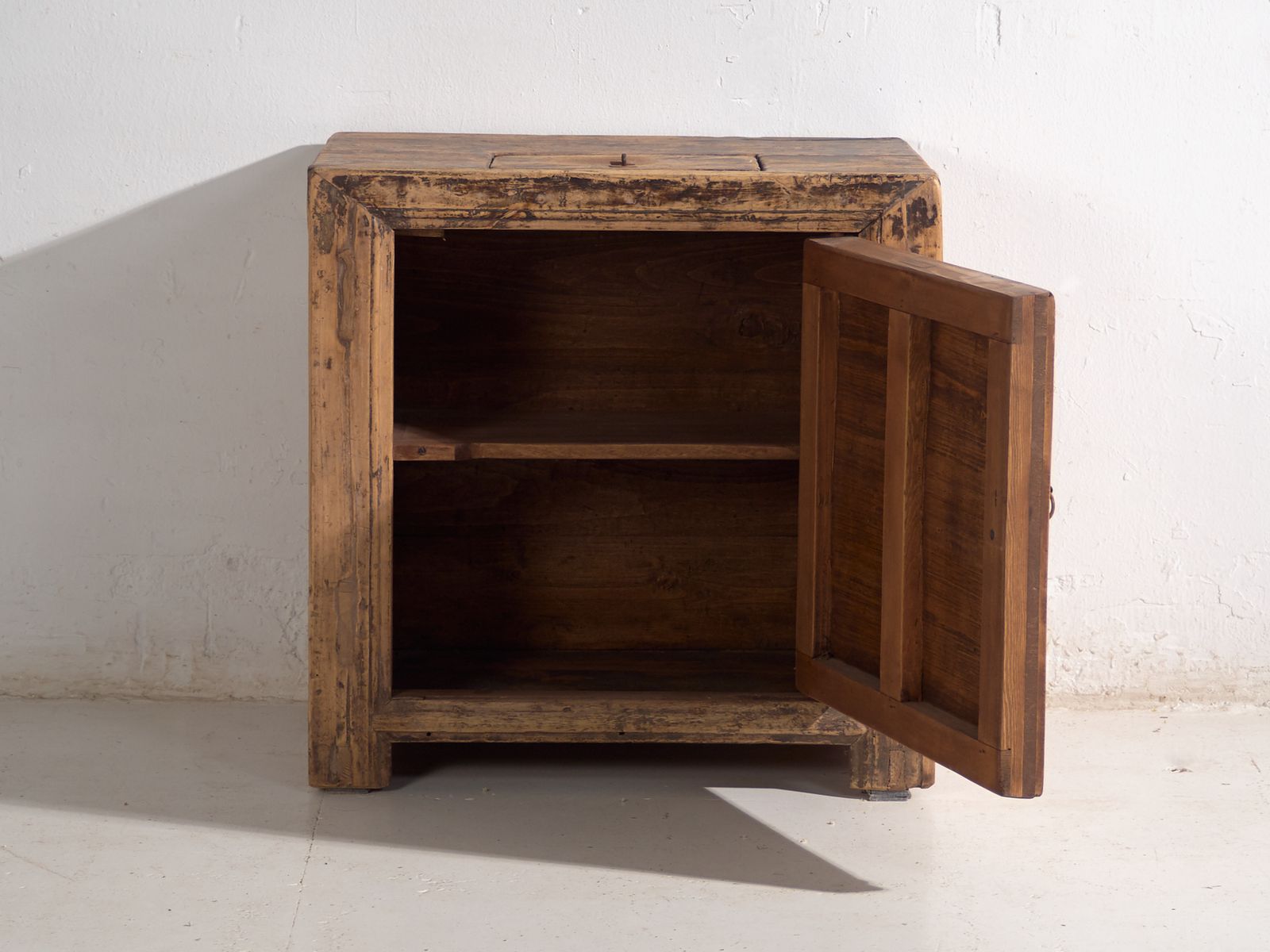 Shanxi Low Cabinet In Elm With Carved Door – China, Circa 1930 photo for sale