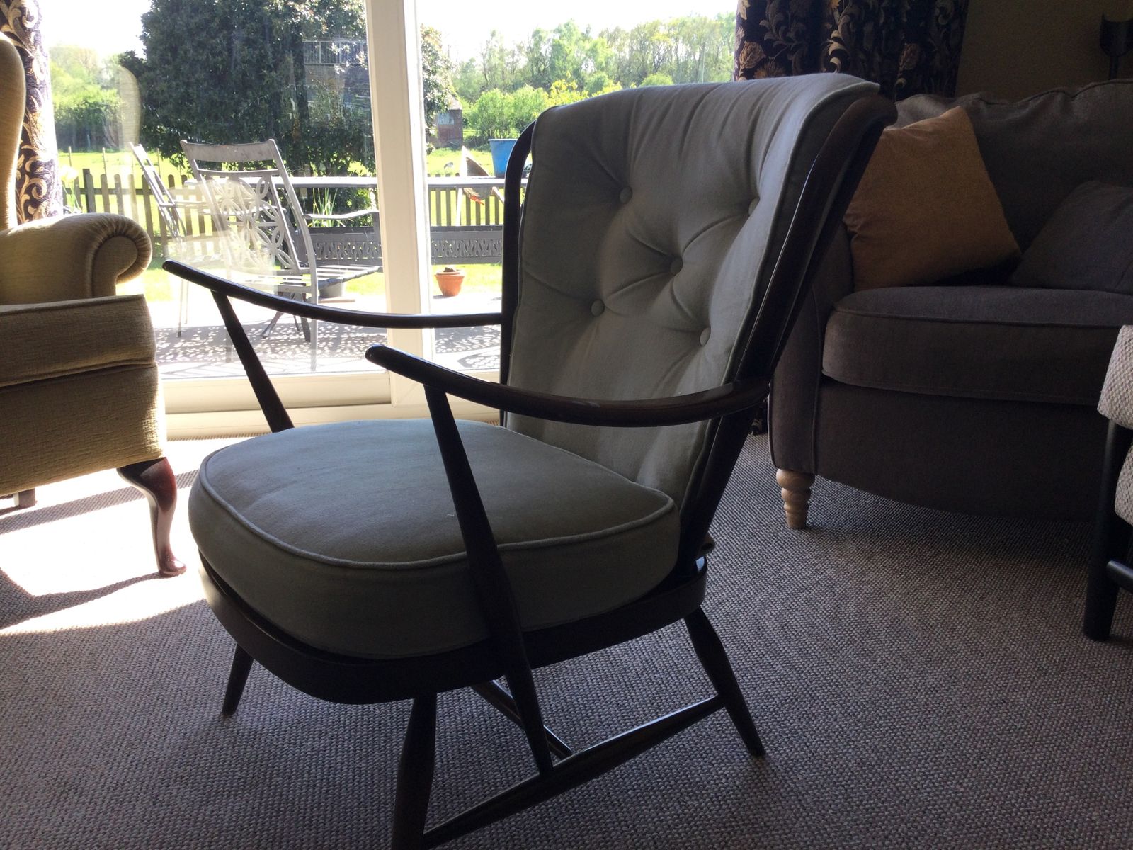Lovely Mid Century Ercol Arm Chair In A Very En Point Light Moss Green Colour. photo for sale