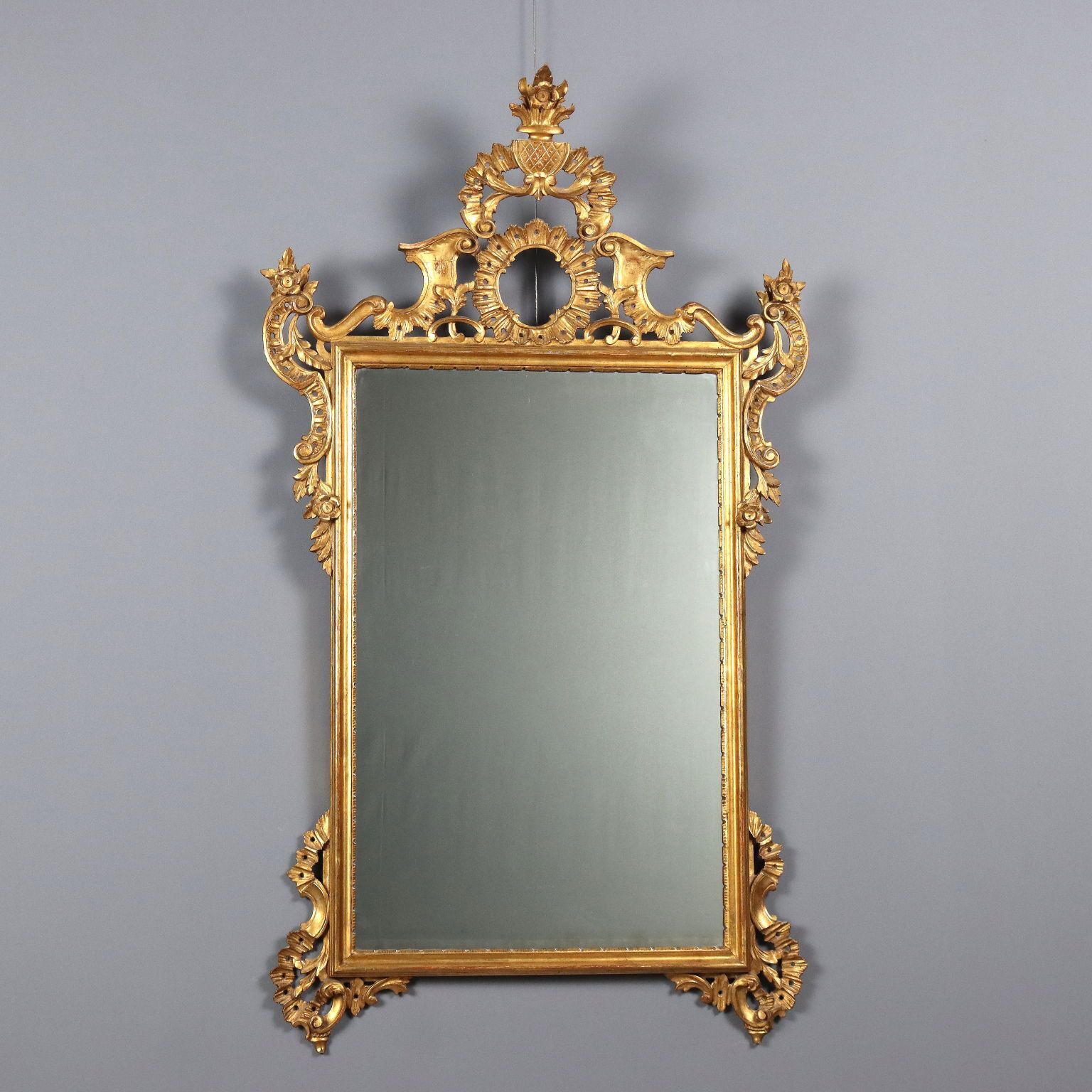 Miroir d'époque en bois sculpté et doré, Italie, XXe siècle