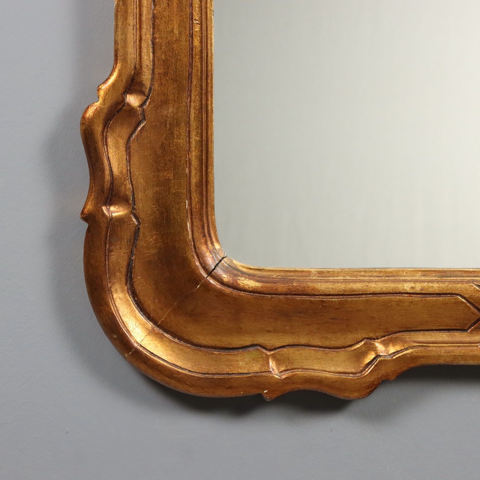 Miroir en bois doré photo vinterior