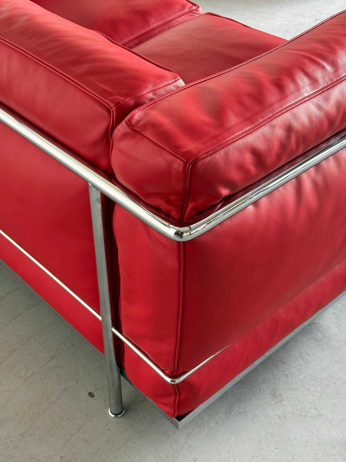 4342.0 Iconic ‘Lc2’ Two Seater Sofa By Le Corbusier, Charlotte Perriand And Pierre Jeanneret For Cassina, Red Leather & Chromed Steel photo