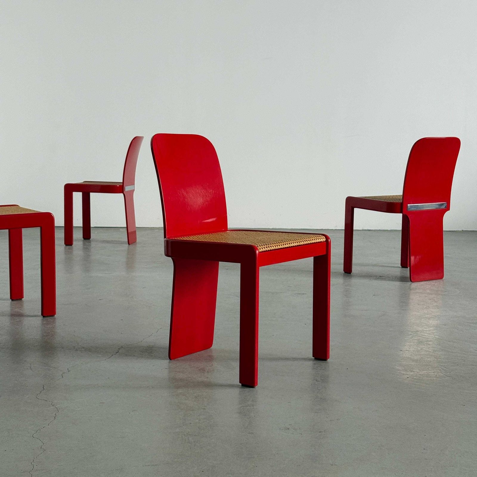Set Of 4 Elegant Italian Mid Century Chairs By Pierluigi Molinari For Pozzi Milano, Red Lacquered Wood And Cane, 1970s