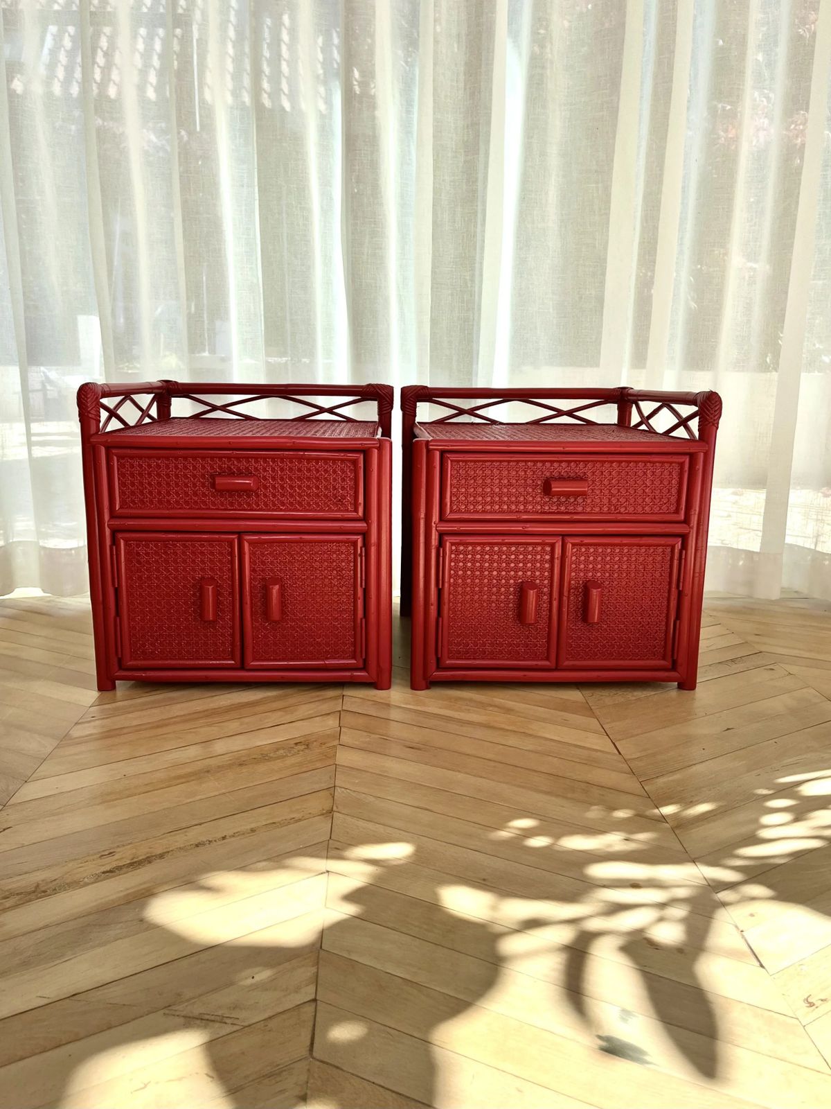 Pair Of Red Lacquered, Bamboo And Cane Bedside Cabinets