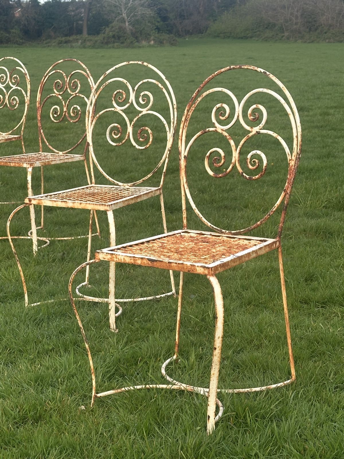 A Set Of Four French Painted Iron Garden Chairs photo for sale