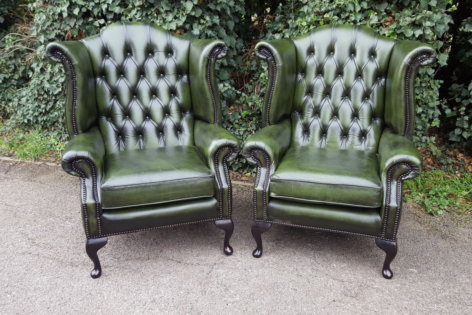 photo for sale Matching Pair Of Mahogany Green Leather Chesterfield Wingback Armchairs
