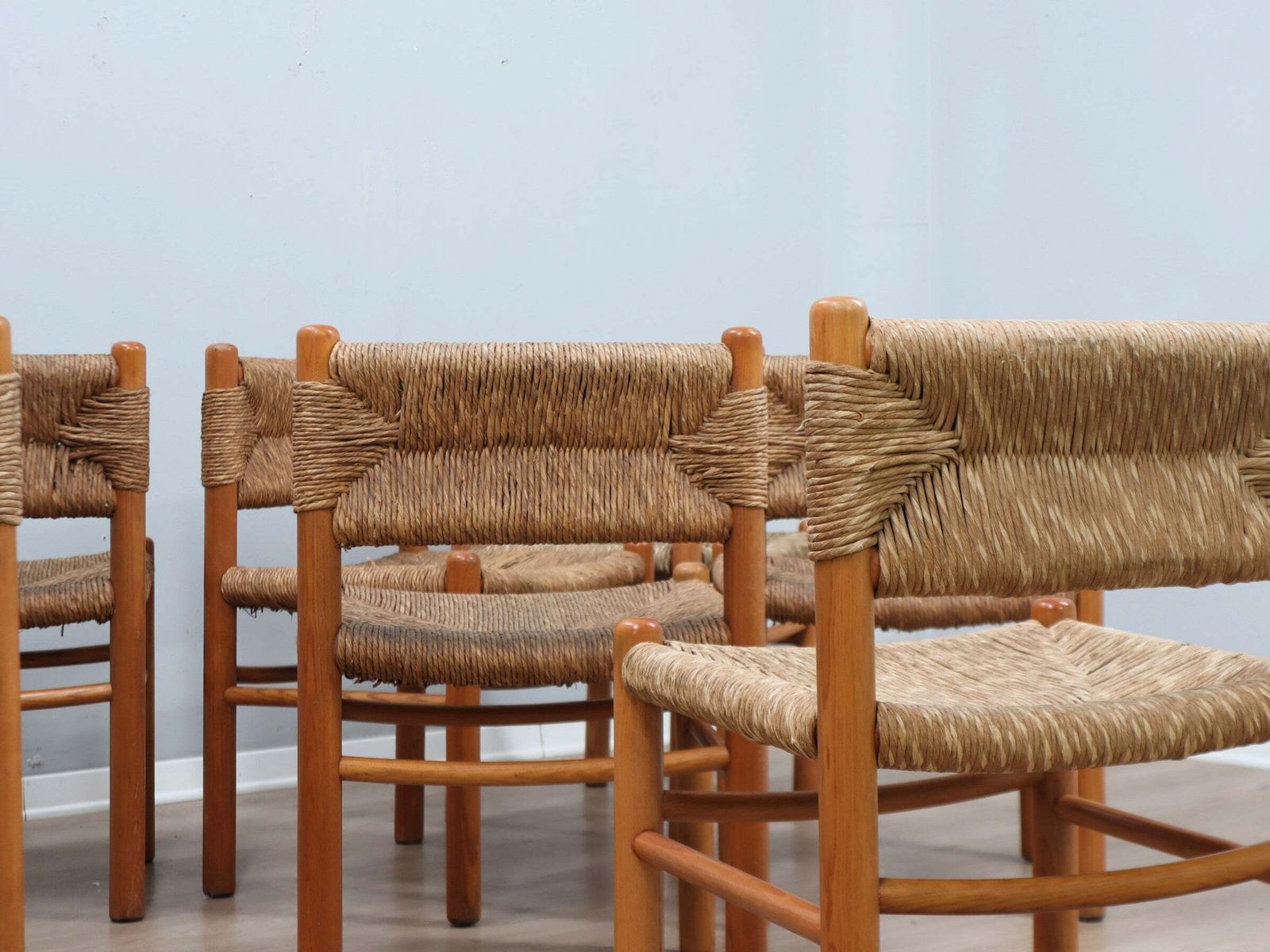 photo buy Set Of 8 Chairs 1960s Charlotte Perriand Style Woven Straw & Wood