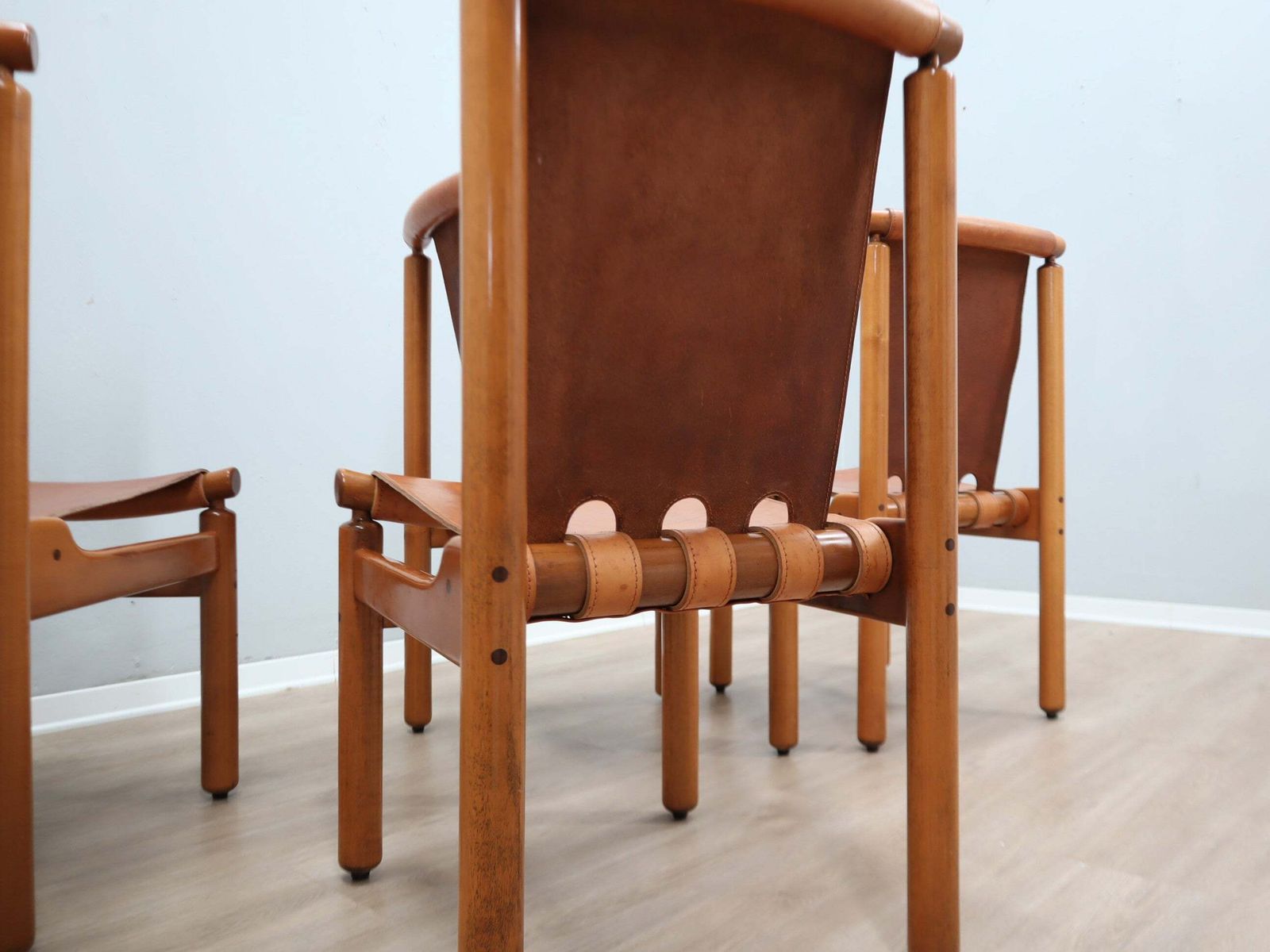 photo buy Set Of 4 Ilmari Tapiovaara For La Permanente Walnut And Leather Chairs 1960s