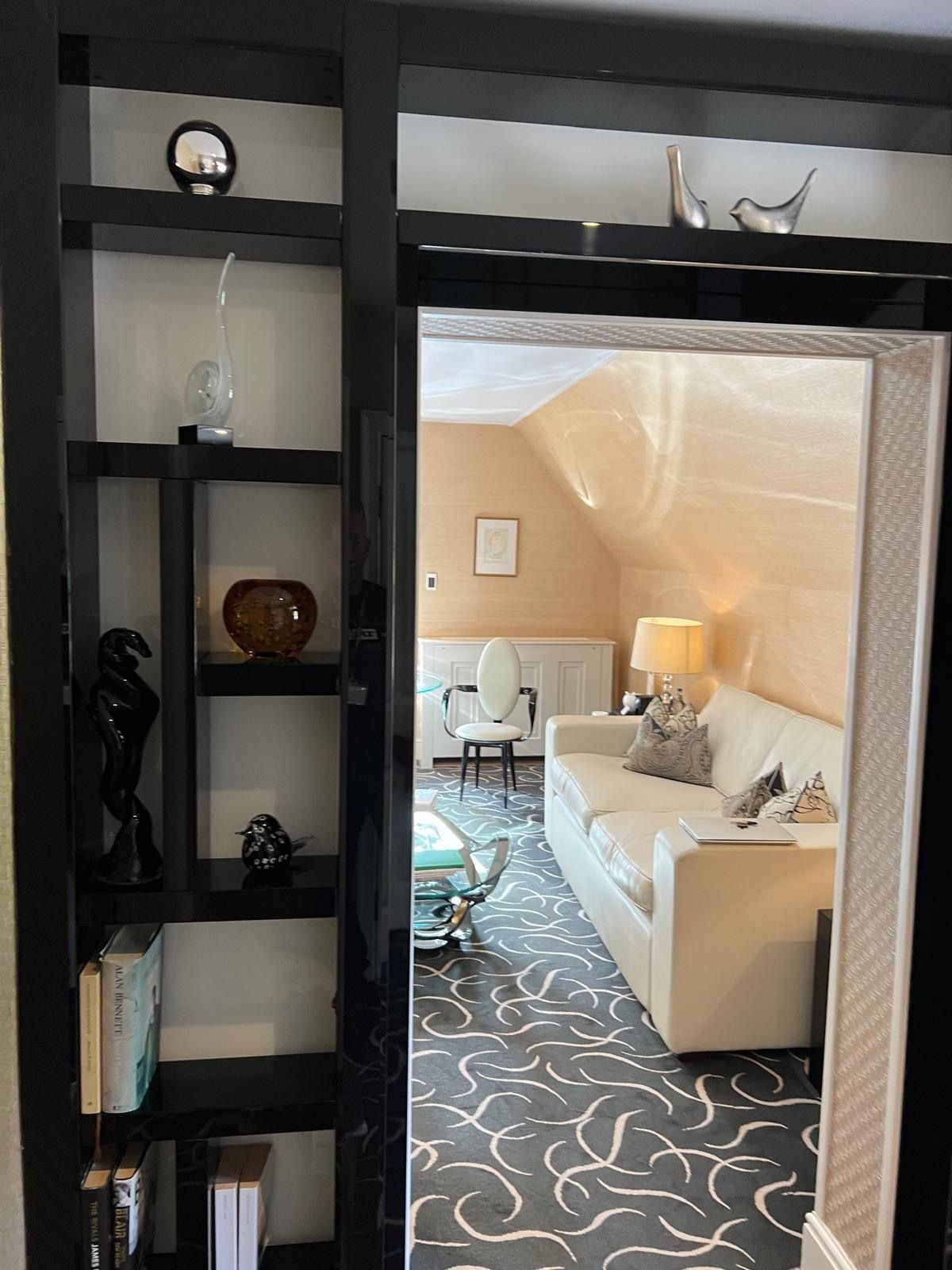 Bespoke Designer Black Shiny Lacquered Bookcase Over Doorway Designed By R.B Manufactured In Italy By Reflex photo furniture