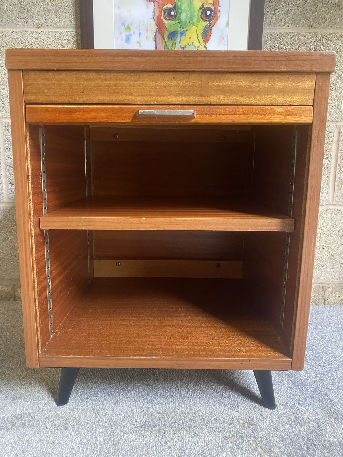 A Charming Vintage Mid Century Record Cabinet With A Tambour Front, Warm Wood Grain And Smart Tapered Legs. photo vinterior