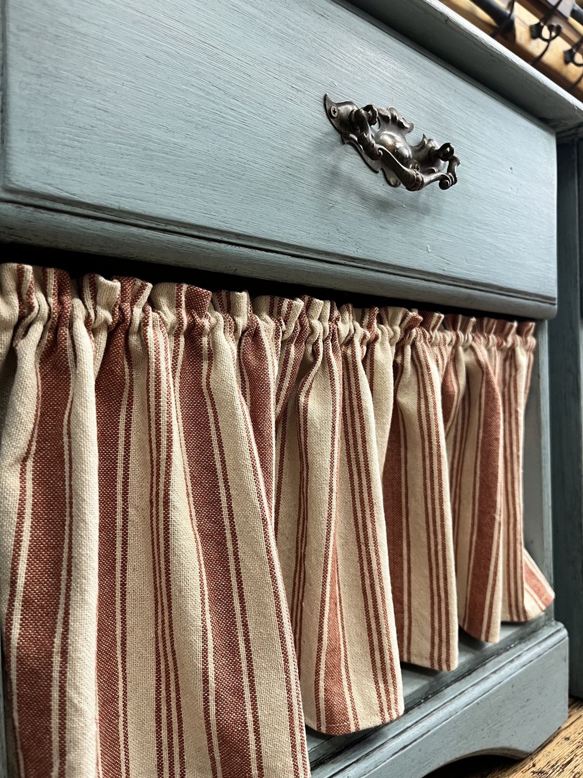 Pair Of Blue Bedside Tables With Striped Cafe Curtains photo Furniture