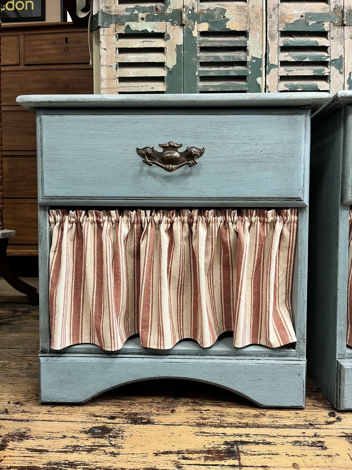 Pair Of Blue Bedside Tables With Striped Cafe Curtains photo vinterior