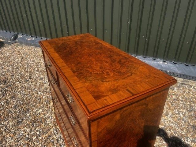 A George II Style Burr Walnut Chest Of Drawers. photo Furniture