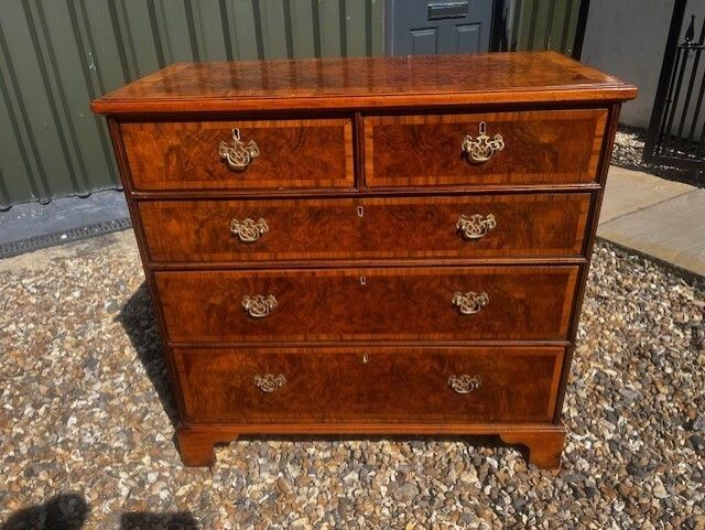 A George II Style Burr Walnut Chest Of Drawers. photo 1150.0