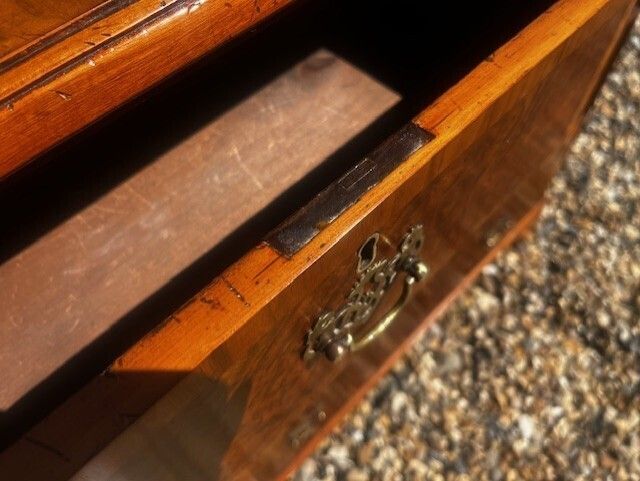 A George II Style Burr Walnut Chest Of Drawers. photo vinterior