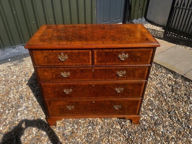 photo for sale A George II Style Burr Walnut Chest Of Drawers.