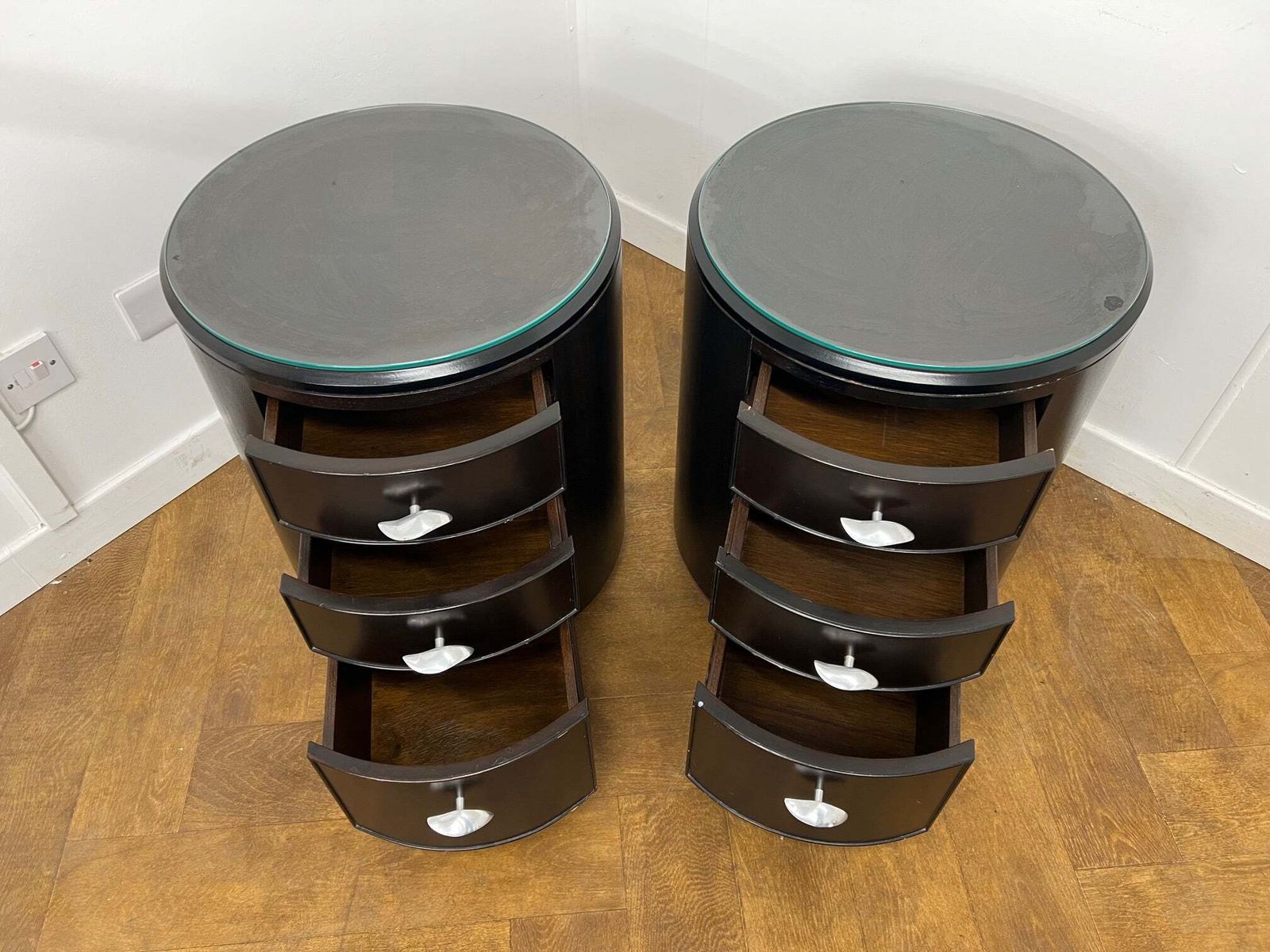 A Pair Of Italian Cylindrical 3 Drawer Beside Drawers In Stained Dark Mahogany With Glass Top photo for sale