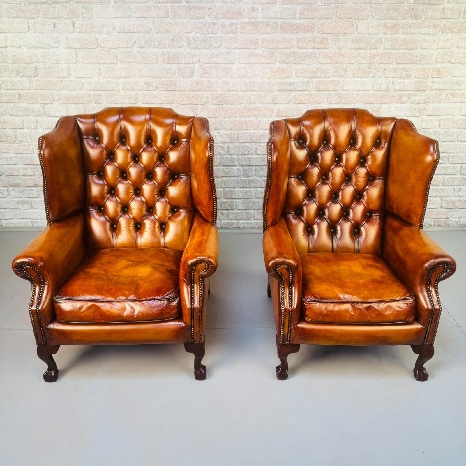Vintage English Pair Of Hand Dyed Tan Leather Wingback Chairs photo vinterior