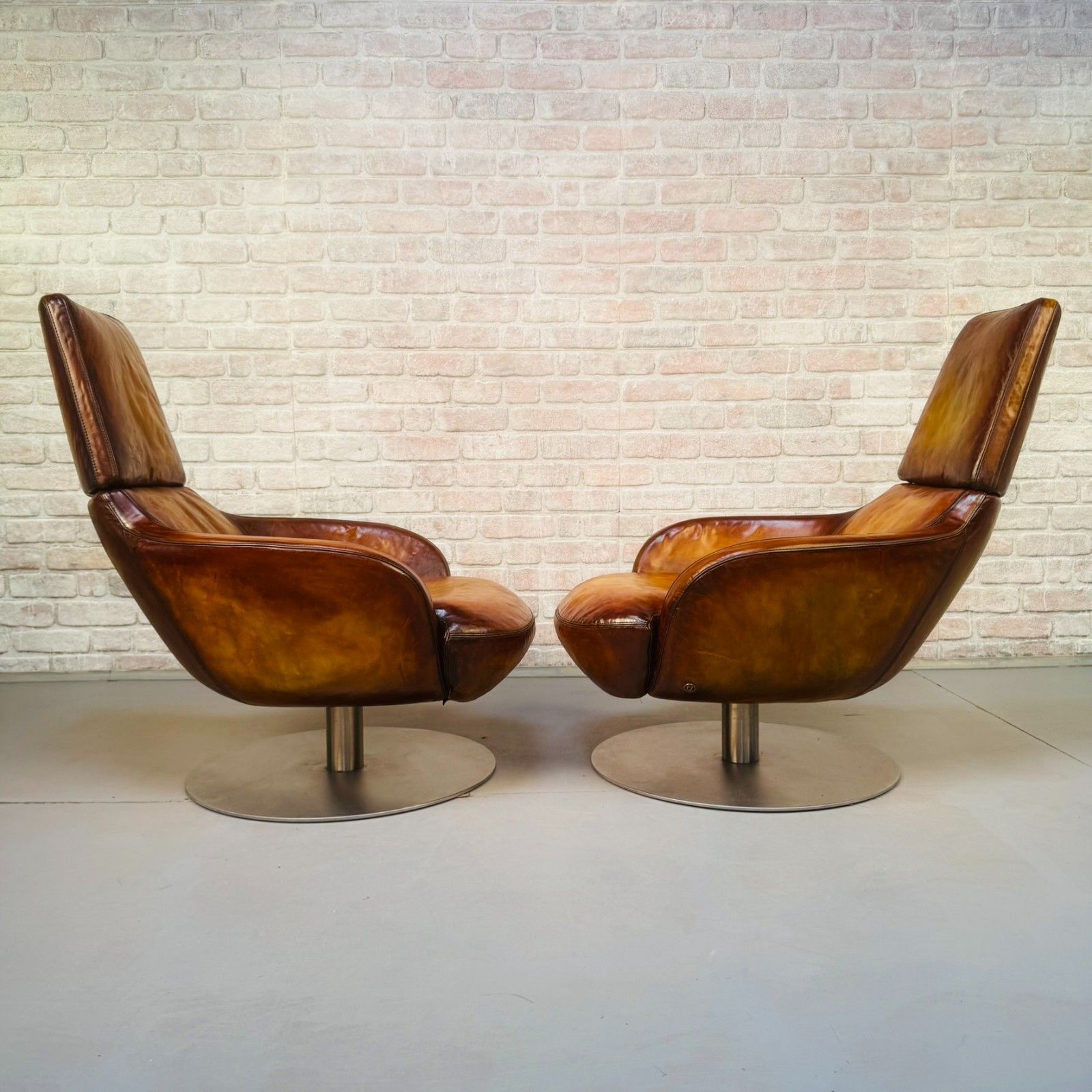 Pair Of Vintage Italian Swivel Tan Leather Chairs photo 1953.0
