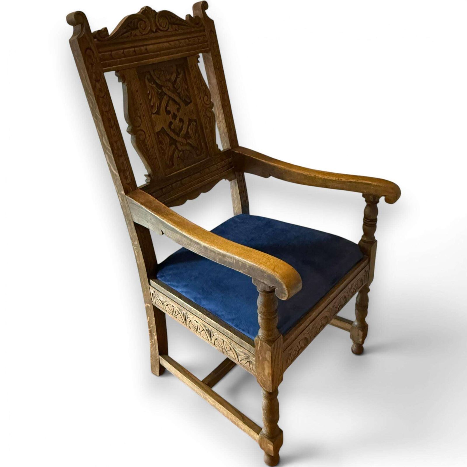 Vintage Carved Oak Gothic Revival Armchair With Blue Velvet Seat. photo vintage