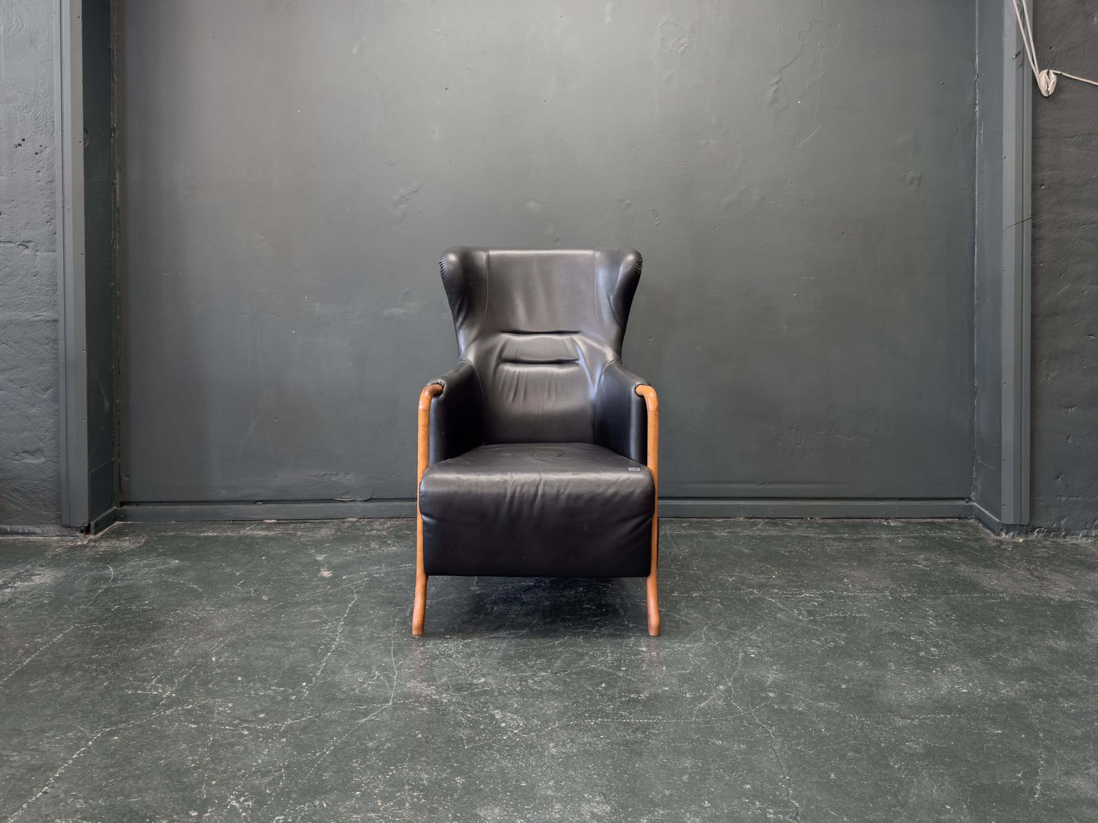 'Claudia' Black Leather And Beech Highback Armchair With Footstool By Stouby photo 960.0