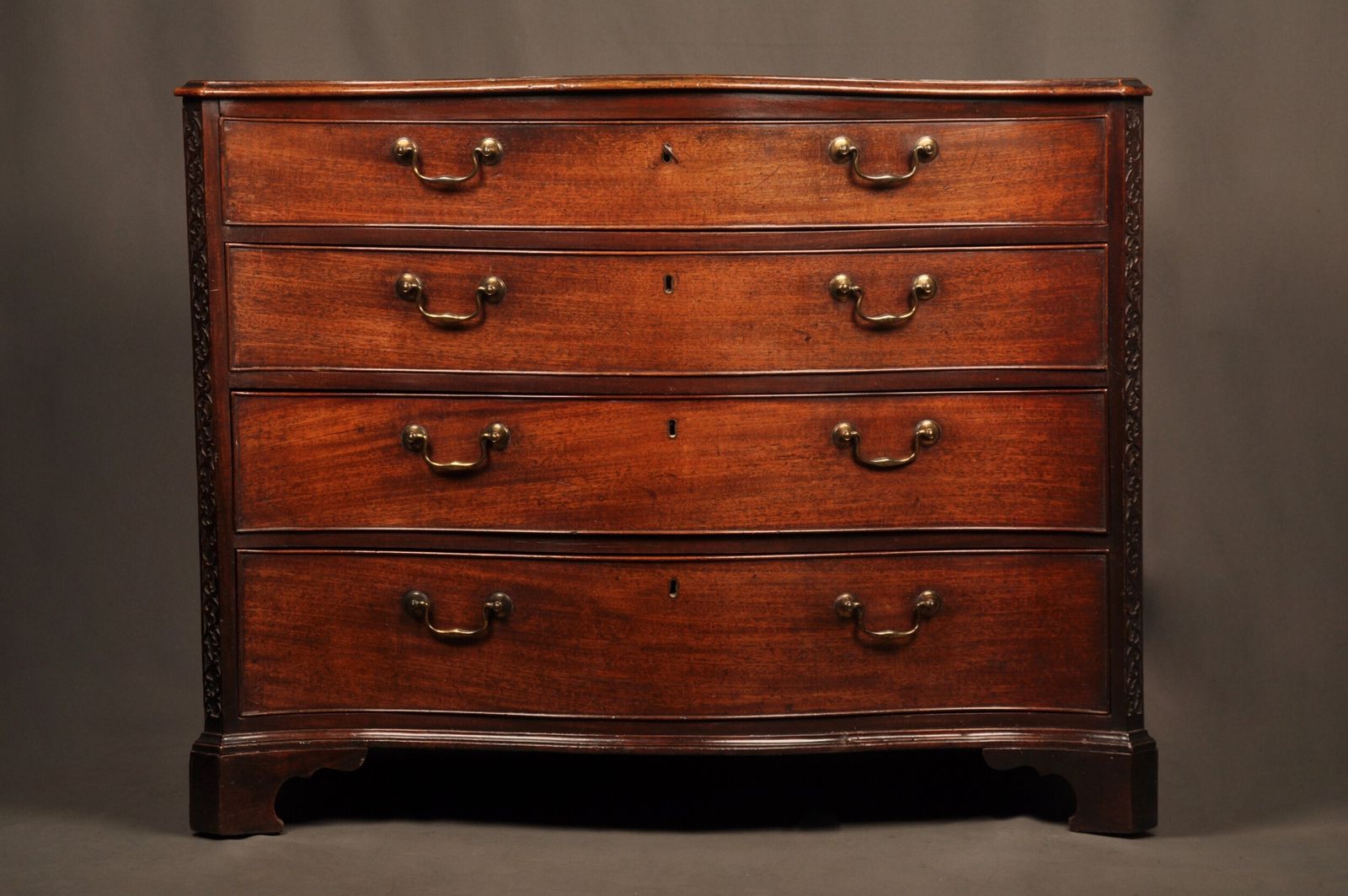 A Fine 18th Century Serpentine Chest Of Drawers photo furniture