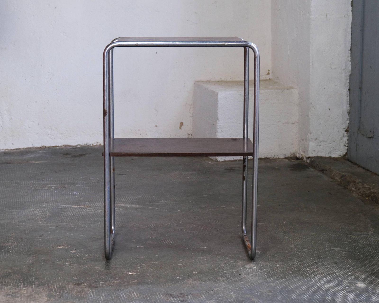 Narrow Bauhaus Side Table With Brown Wooden Shelves photo furniture