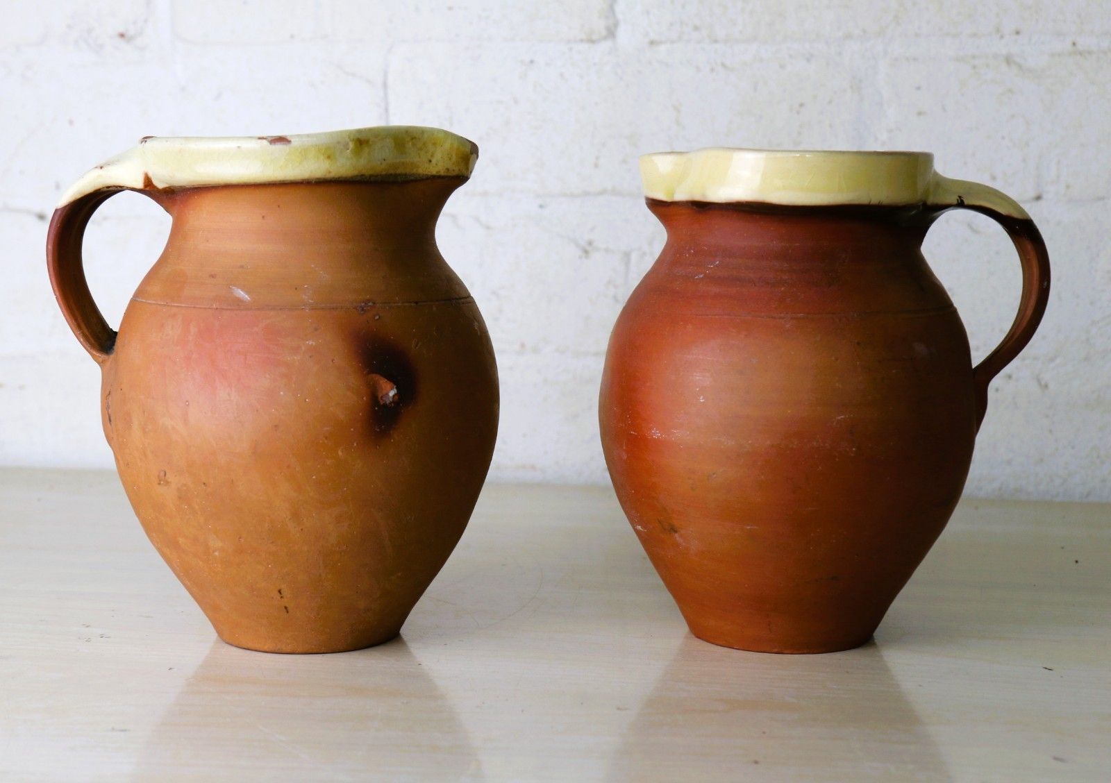 Two Antique 19th Century Jugs Terracotta Slip Glazed Internally With A Cream Rim photo furniture