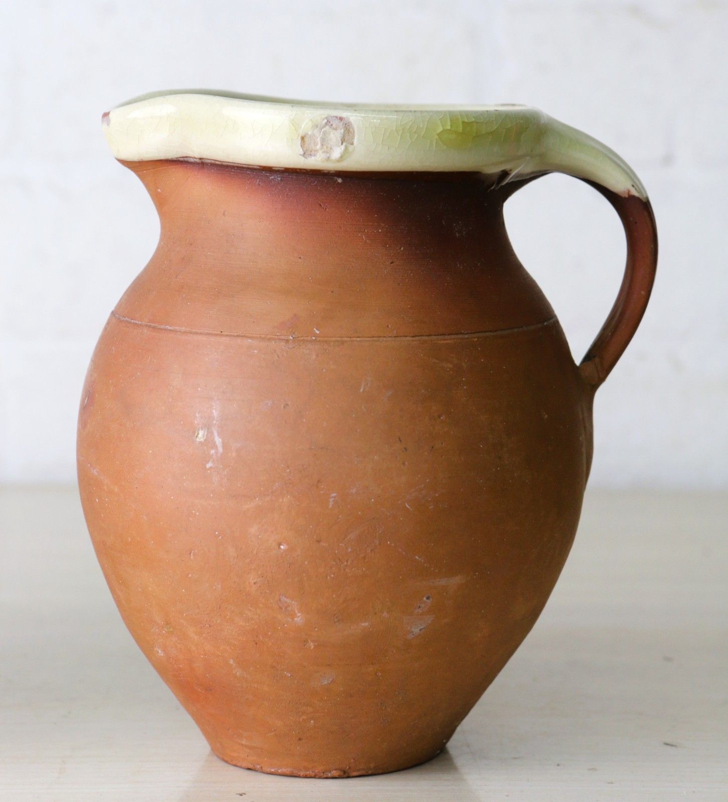 photo vintage Two Antique 19th Century Jugs Terracotta Slip Glazed Internally With A Cream Rim